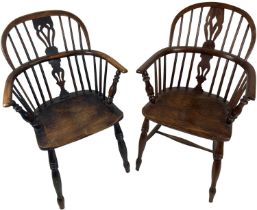 A late 19th Century yew and elm stick back Kitchen Armchair, with arched back and pierced central