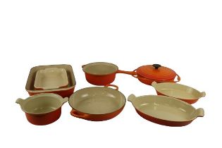 A collection of 8 varied rectangular and oval shaped Le Creuset Baking and Pie Trays, coloured