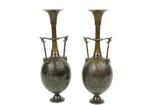 A pair of 19th Century Japanese design bronze two handled Urns, of trumpet form, cast by Ferdinard