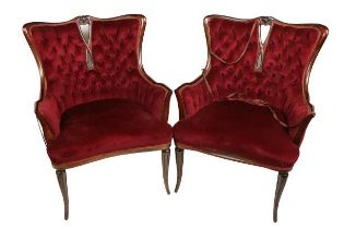 A pair of Edwardian mahogany button back Armchairs, with shell crest and open splat, above a concave