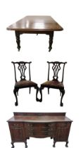 A fine quality Irish mahogany Dining Table, in the manner of Strahan, the moulded top with three