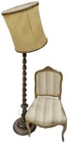 A Louis XV style giltwood Side Chair, with padded back and seat covered in striped cream material on