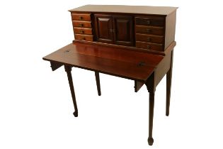 A Georgian style stained wooden Ladies Bureau, the top with central doors and series of drawers,