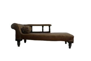 An Edwardian Apprentice Piece, modelled as a chaise longue covered in faux leather with rail back on