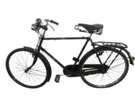 A three speed Raleigh Gentlemen's Bike, with bell, light, brooks leather seat and spoked wheels. (1)