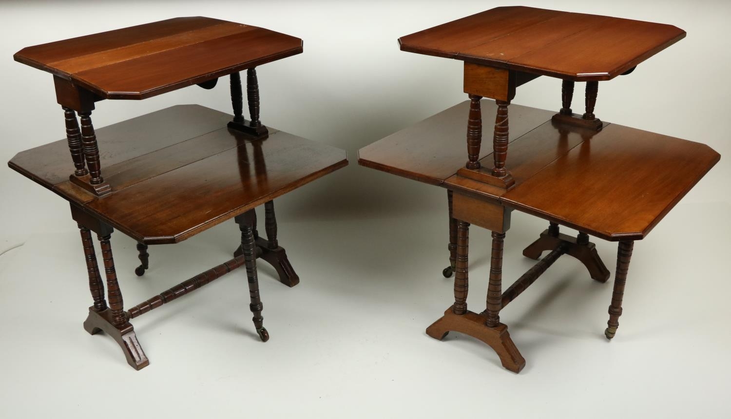 An unusual pair of Edwardian walnut two tier Sutherland Tables, each tier with two rectangular flaps - Image 2 of 4