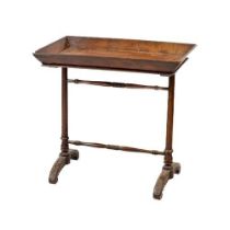 A fine quality Irish mahogany William IV tray top Table, united by turned stretchers, on carved leaf