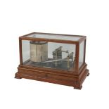 An Edwardian oak cased and glazed Barograph, by C.D. Wilson of Elgin (with nameplate), above