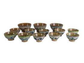 Three large varied design Nicholas Mosse pottery Bowls, (cow, blueberry, and red berry), a set of