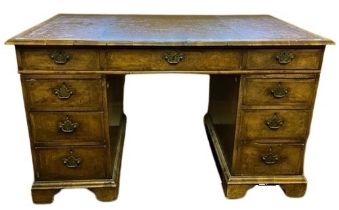 A quality 19th Century walnut pedestal Desk, of small proportions, the leather inset top with