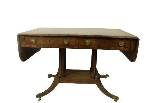 An Irish Regency period Provincial mahogany drop-leaf Sofa Table, possibly Cork, the top with double