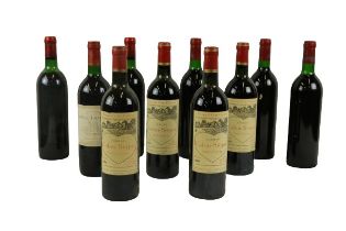 Wine: Four Bottles of Chateau Calon Segur Saint Estephe 1979 (labelled); two Bottles of Chateau