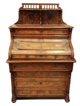 A 19th Century Continental walnut cylinder Bureau, the upper serpentine fronted bracket shelf with