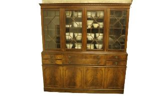 A Georgian style mahogany four door Bureau Bookcase, the dentil moulded cornice over four astragal