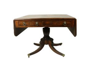 An attractive George III mahogany Sofa Table, with rosewood crossbanded top over two frieze