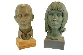 A bronzed plaster Bust of young Lady signed C.B. 41cms (16") and another of a young Man, on wooden