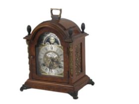 A Georgian style miniature Mantle Clock (ORM), with domed top brass, carrying handle and finial, the