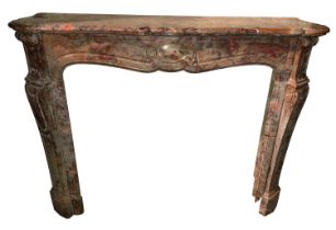 A very good 19th Century French variegated marble Fireplace, of rococo design with serpentine top,