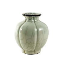An attractive and heavy cream ground Crackleware bulbous Chinese Vase, the shaped top over reeded