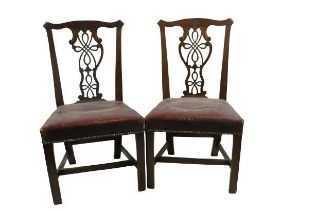 A set of 6 mahogany Chippendale style Dining Chairs, with ornate splat back (some damage)covered