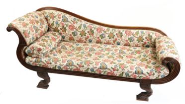 A fine Regency period mahogany Chaise Longue, in the manner of Thomas Hope, with reeded scroll