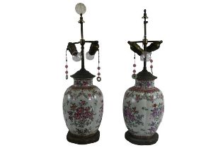 A pair of Famille rose style porcelain floral decorated vase shaped Table Lamps, with gilt metal