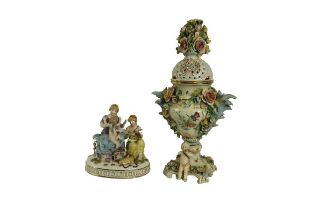 A flower encrusted Sitzendorf style porcelain Pot Pourri Vase & Cover, decorated with flowers, the
