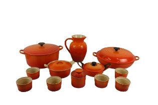 A large two handled circular Stewing Pot and Cover, another domed top circular Pan and cover, a