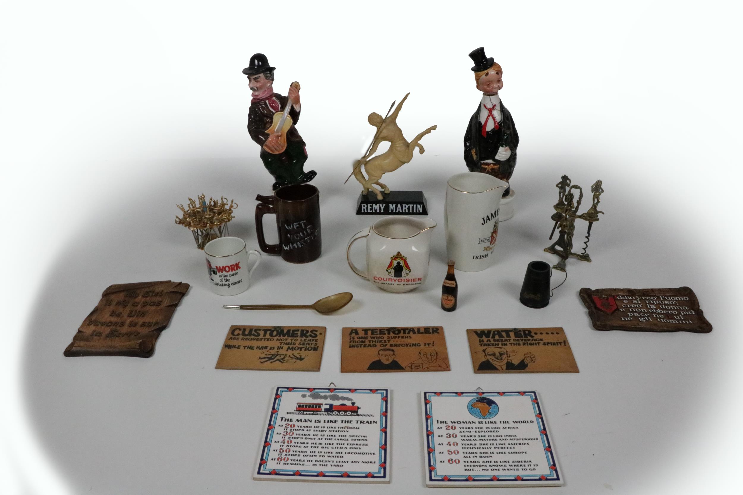 A collection of Pub Memorabilia, comprising jugs, signs and figures, Remy Martin, Jameson -