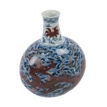 An attractive Chinese blue and white bottle shaped Vase, with crackleware decoration and floating
