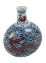 An attractive Chinese blue and white bottle shaped Vase, with crackleware decoration and floating