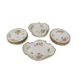 An attractive 11 piece Limoges French porcelain Dessert Service, each decorated with pink flowers,