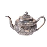 An attractive Irish Georgian period oval shaped silver Teapot, by Robert Breading, Dublin 1804,