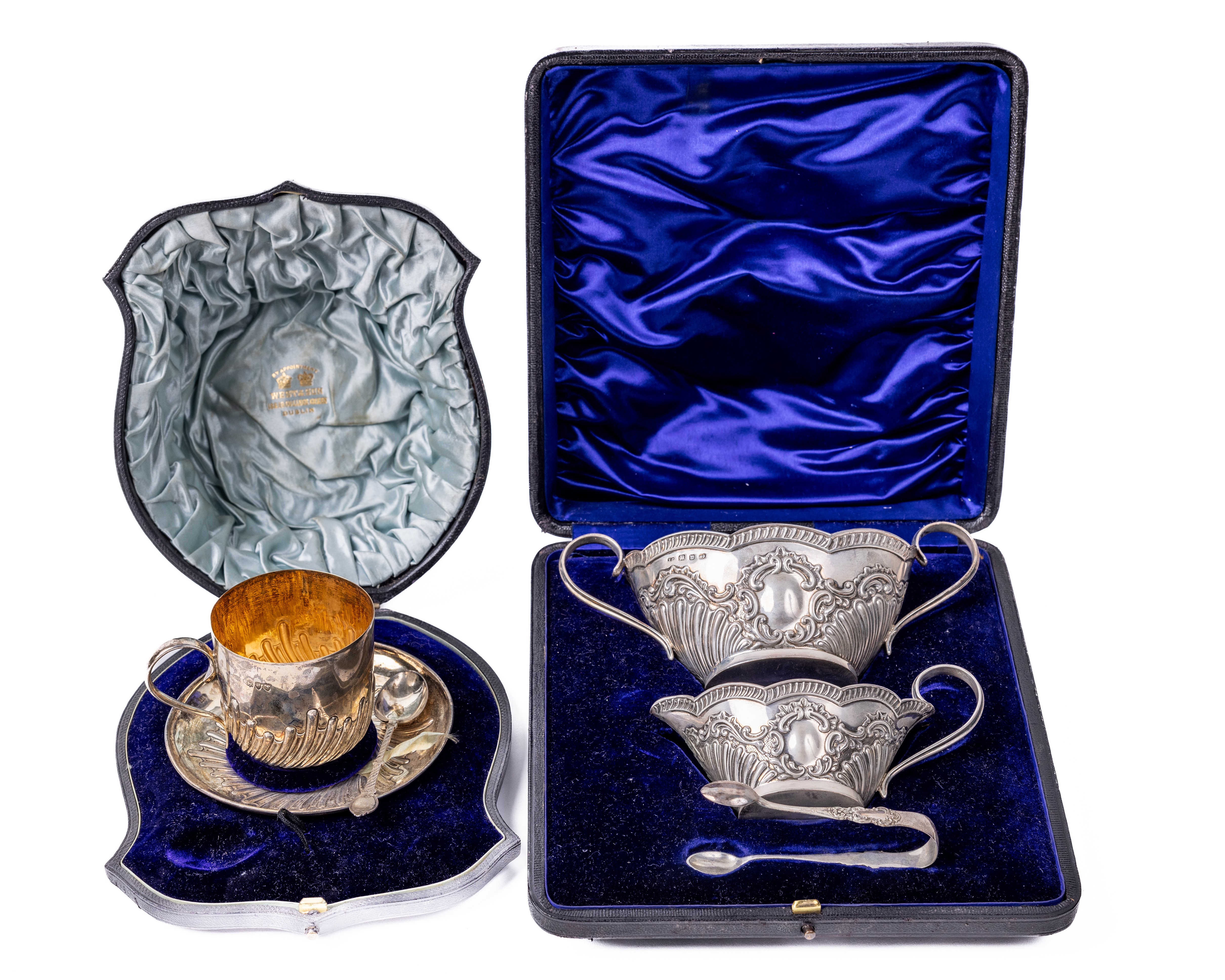 A cased English silver Christening Cup and Saucer, and Spoon, by E.H. (Wm. Hutton & Sons) retailed