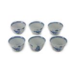 A set of 6 Chinese blue and white Tea Cups, each with landscape medallion interior, the exterior