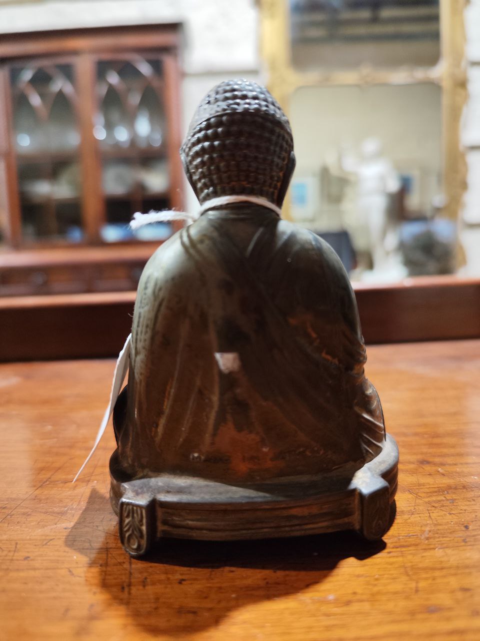 A blanc-de-chine Figure of a Buddha, a pair of carved ebony Elephants, a heavy engraved brass Bell - Image 11 of 16