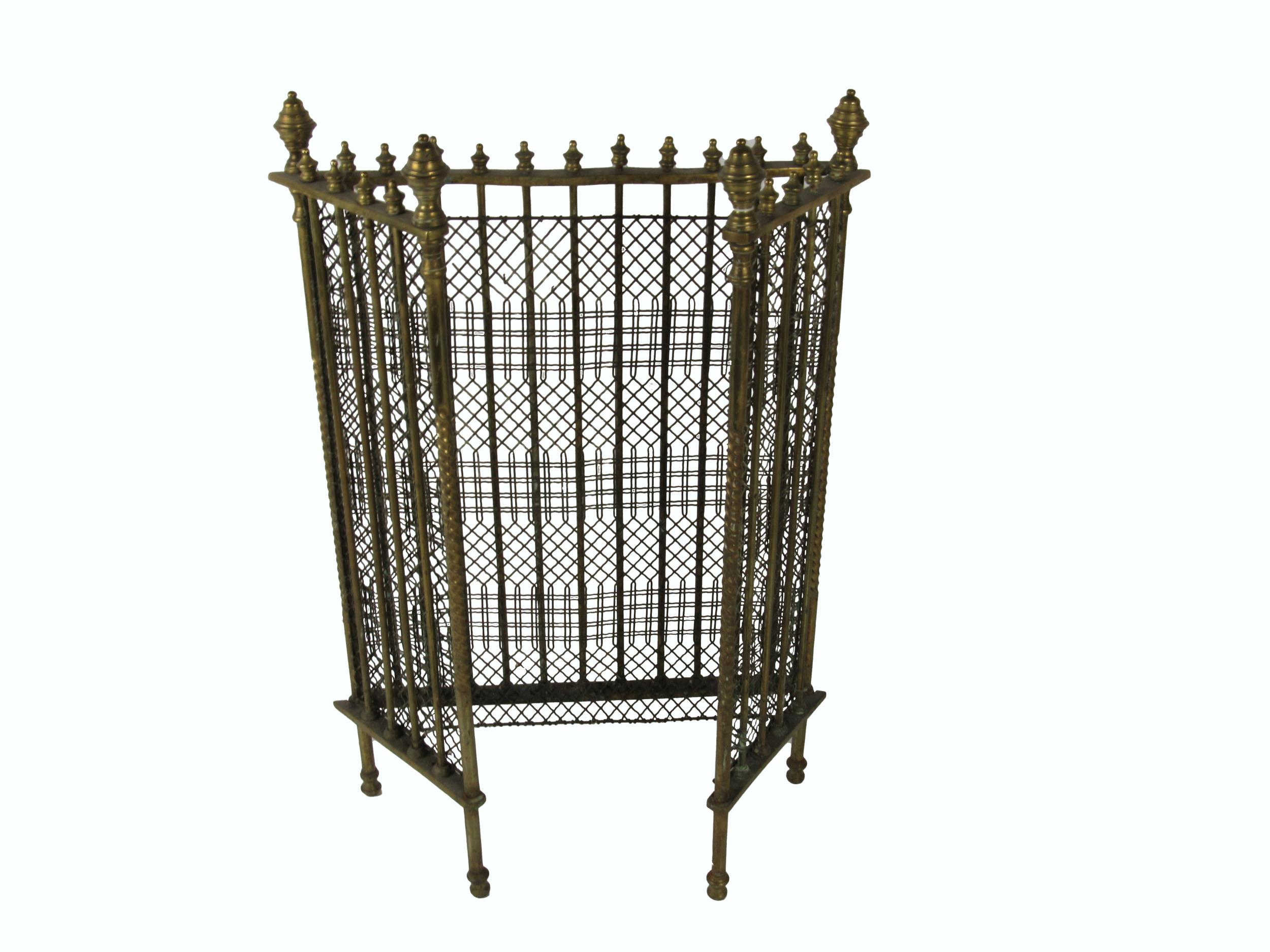 A 19th Century heavy brass three fold Spark Guard, with multi finial top, with plain pillar