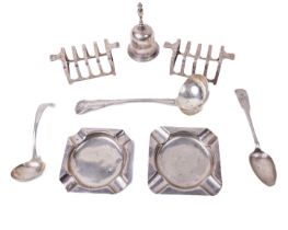 A pair of English silver Art Deco miniature Toast Racks, by Mappin & Webb, a silver Calling Bell,