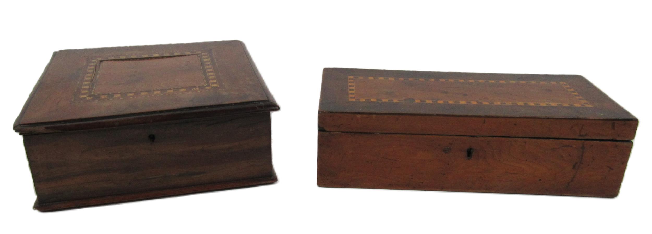 A 19th Century Irish 'Killarney Wood' lift top Box, with chequered inlay top, the reverse