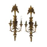 A pair of French style giltwood two branch Wall Sconce Lights, with shades and floral motif. (2)