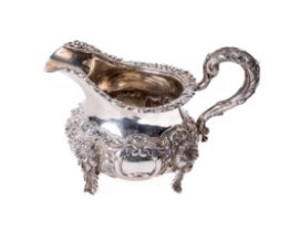 An Irish Victorian period silver Cream Jug, by James Le Bas, c. 1843, the body with floral edge