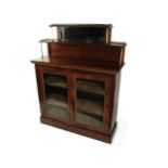 A fine quality Regency period rosewood Chiffonier, the shaped two tier stepped top with pierced