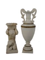 A tall Grecian style two handled alabaster Urn, with ormolu banding on a stepped base, approx. 53cms