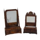 A fine quality early 19th Century walnut Dressing Table Mirror, the arched swing framed mirror