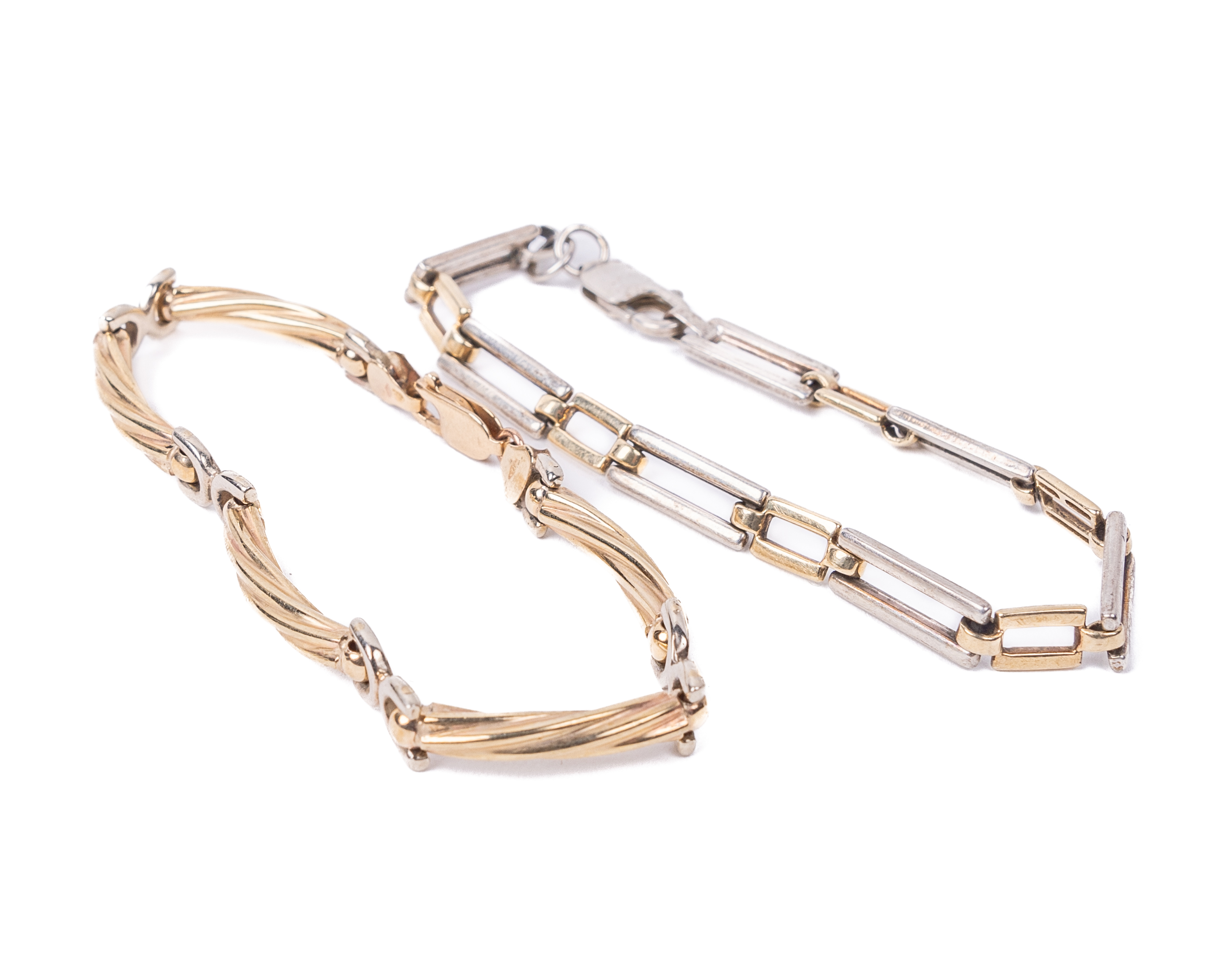 An attractive rope design 9ct gold and silver Ladies Bracelet, with 'C' shaped connections; together