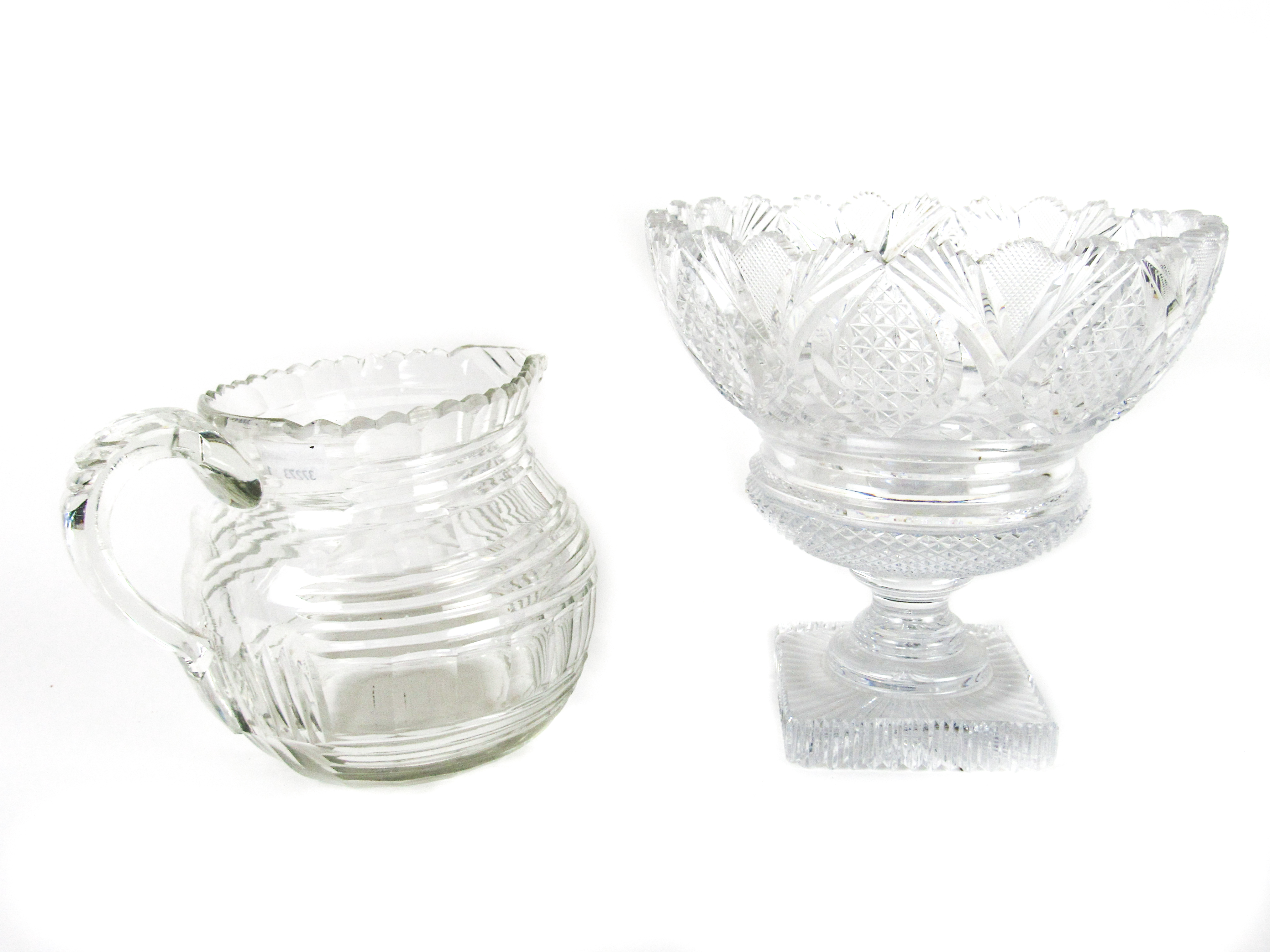 A 19th Century Irish Waterford crystal Water Jug, with multi-pointed rim, narrow spout, shaped