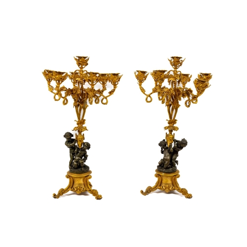 An important large pair of 19th Century French bronze and ormolu seven light Candelabra, with cherub