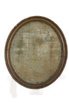 An early 19th Century oval needlework Sampler, "Map of England and Wales," 51cms (20") high, gilt