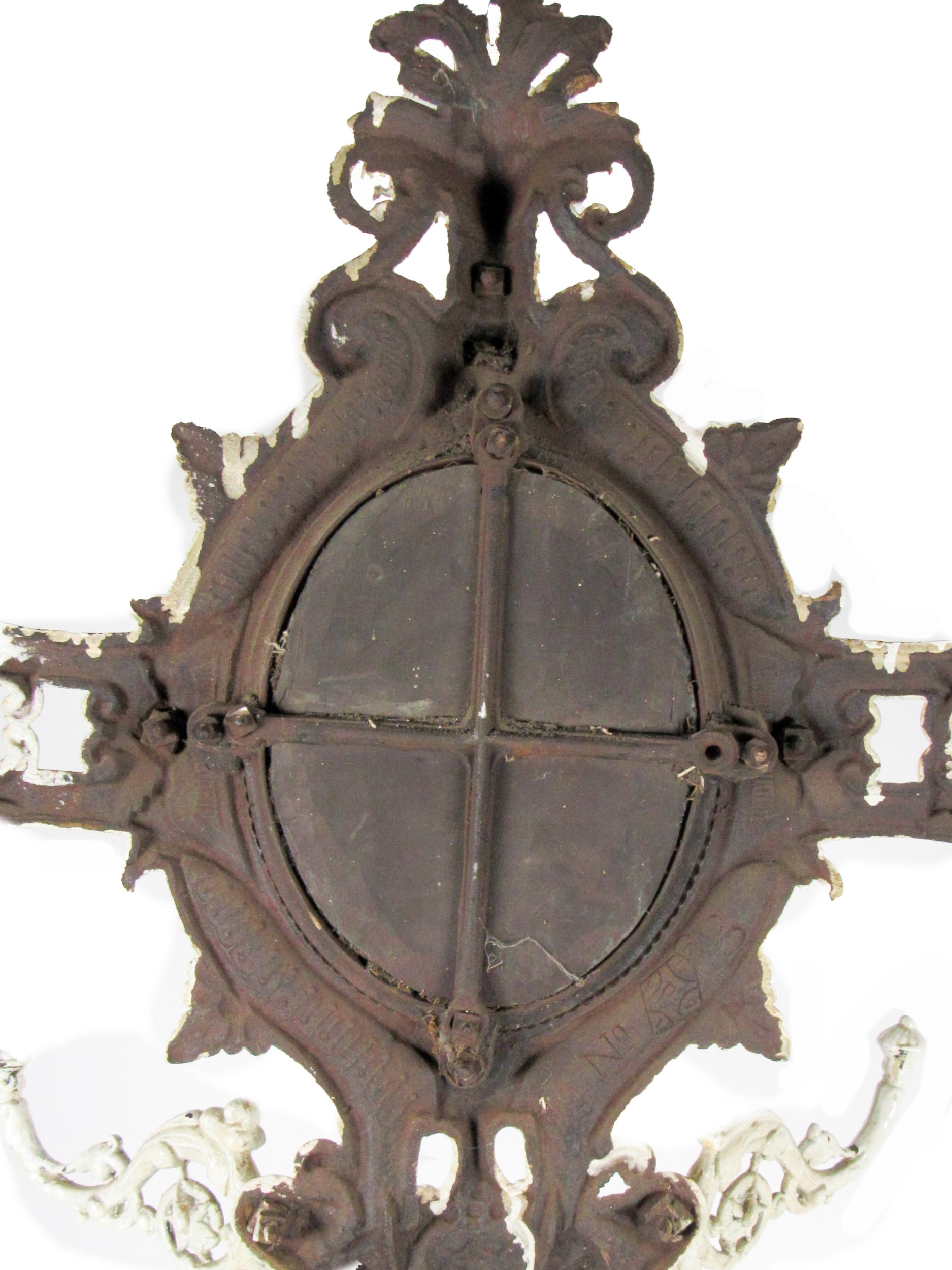 A Victorian Coalbrookdale type cast iron Hat and Coat Stand, with oval mirror back on a pierced - Image 2 of 11