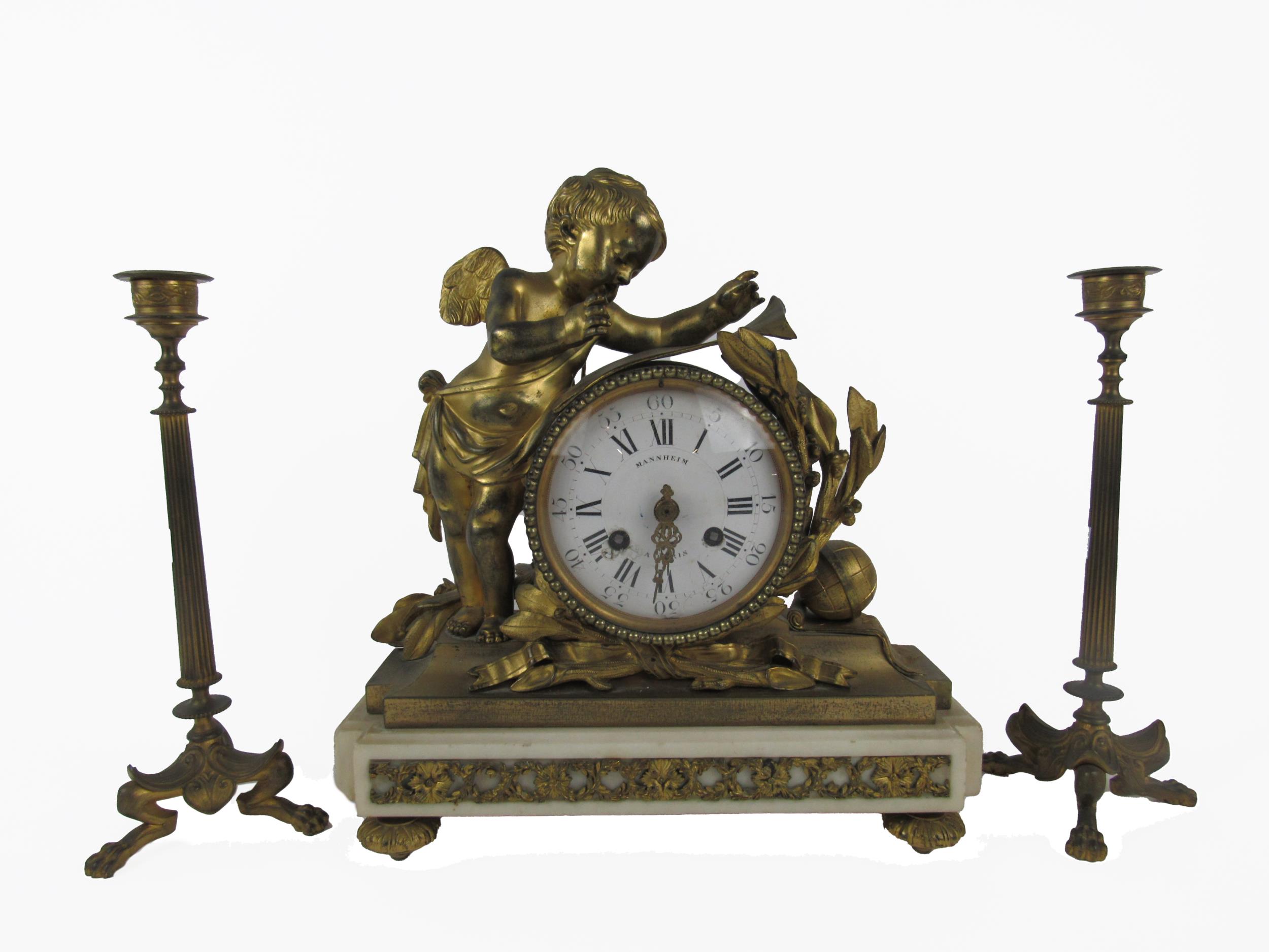 A 19th Century ormolu French Mantle Clock, by Mannheim, Paris, the circular dial with Roman and